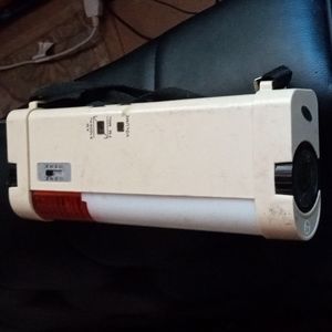 AM/FM Radio flashlight with antenna.
